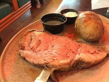 A plate of meat and potatoes.